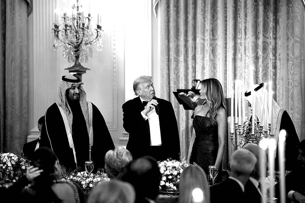 President Trump speaks at a formal East Room dinner as the Saudi Crown Prince looks on.